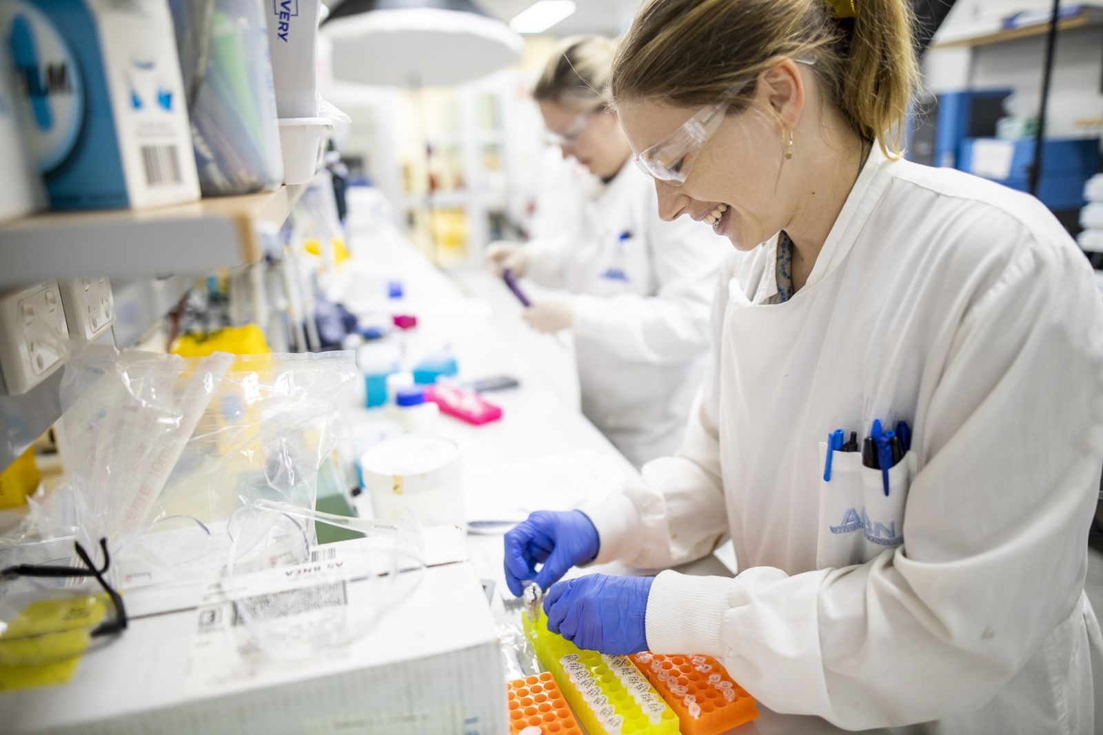 Scientist working with sample tubes